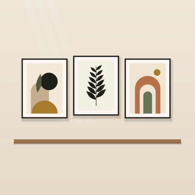Three framed abstract prints in terracotta, charcoal and gold